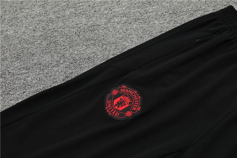 Triple Black Manchester UTD Tracksuit